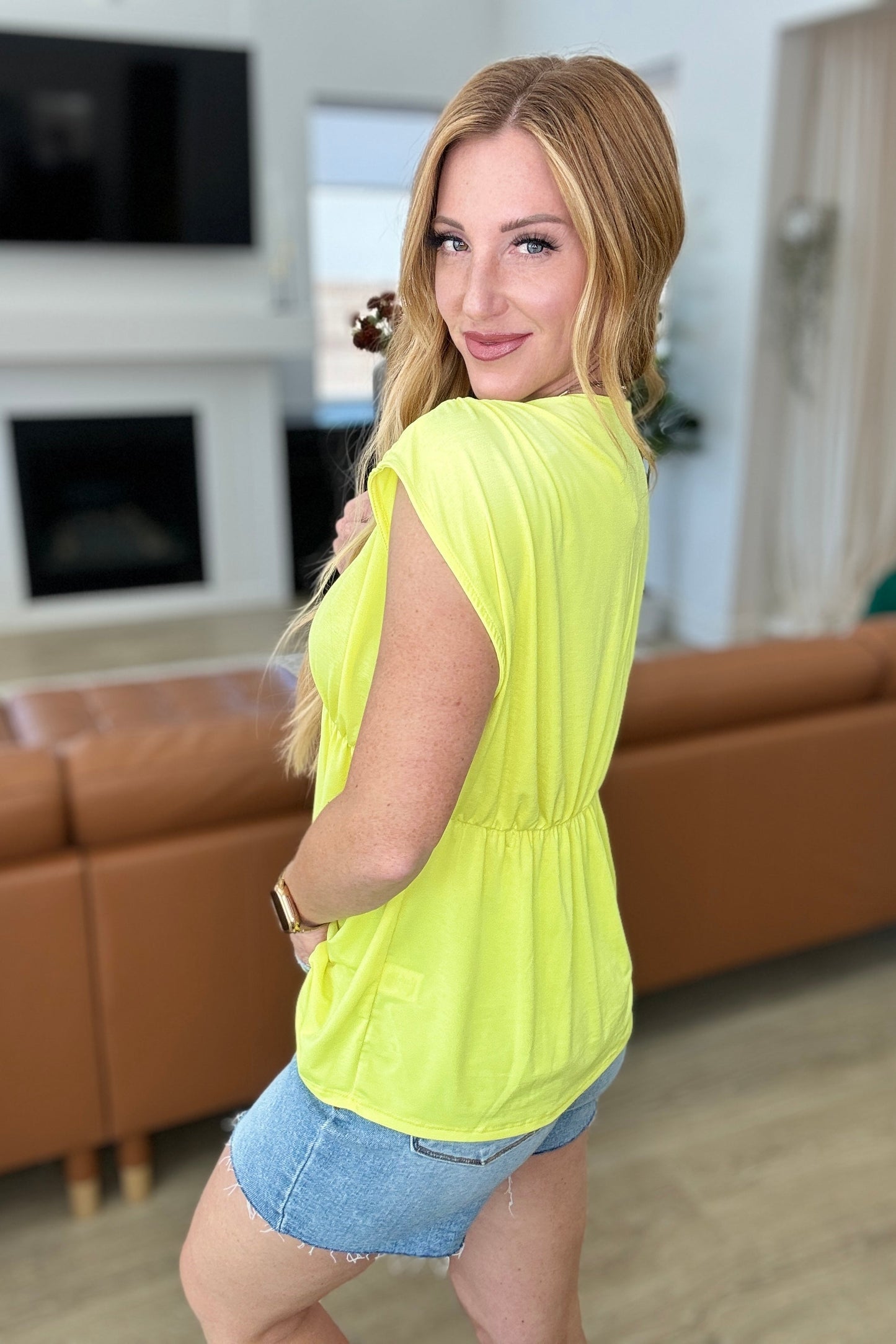 Rhea Peplum Top in Neon Yellow - Southern Divas Boutique