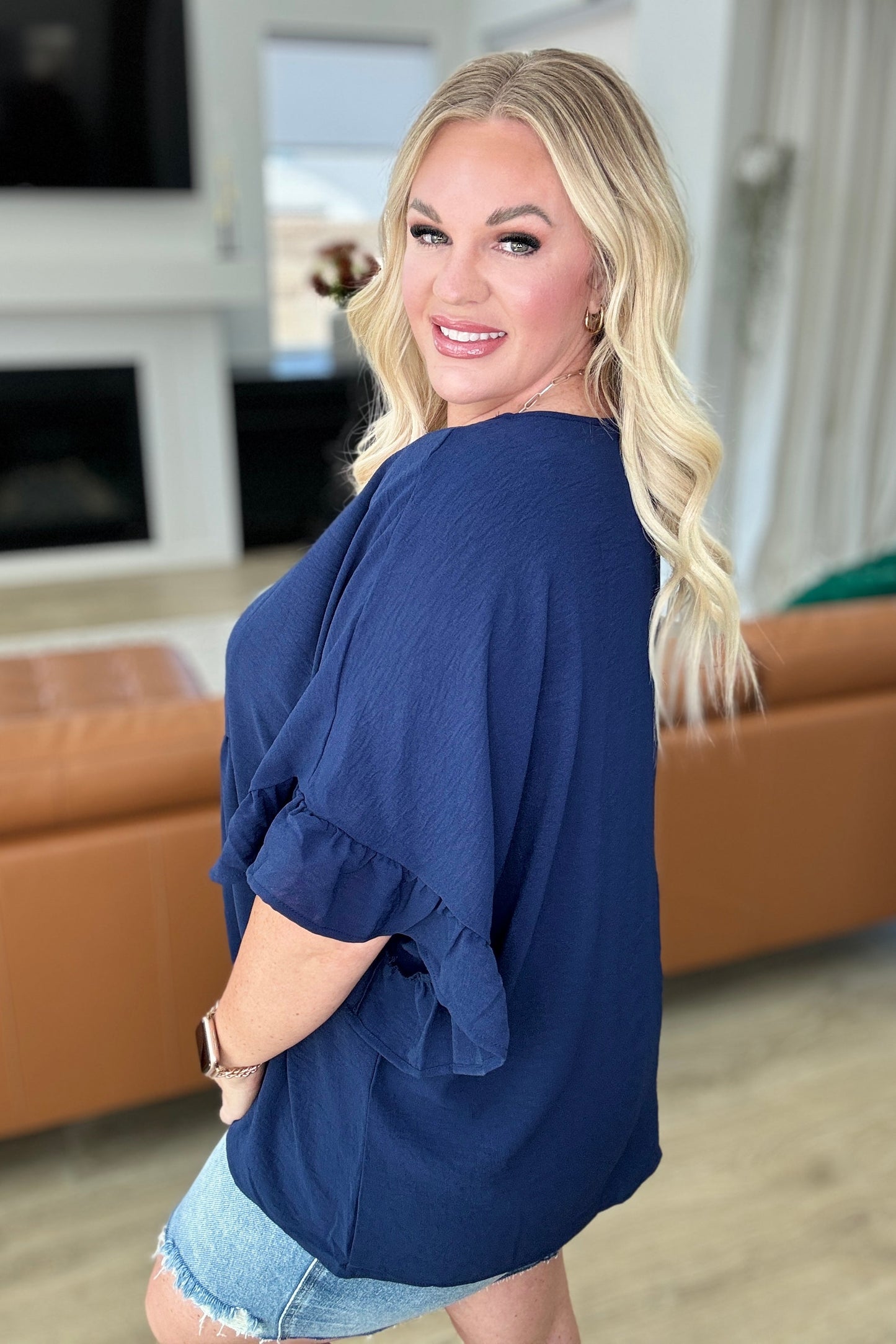 Airflow Peplum Ruffle Sleeve Top in Navy - Southern Divas Boutique